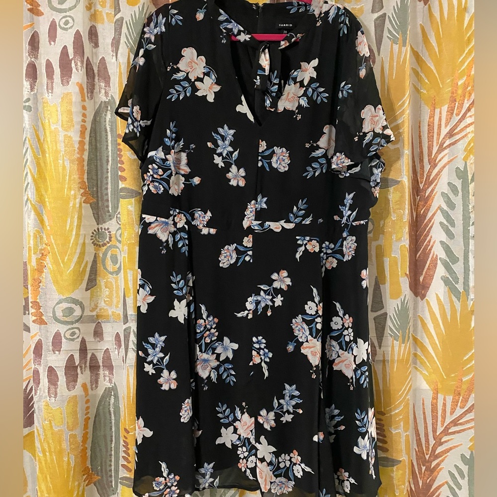 Black Torrid dress with pink and blue floral print.
